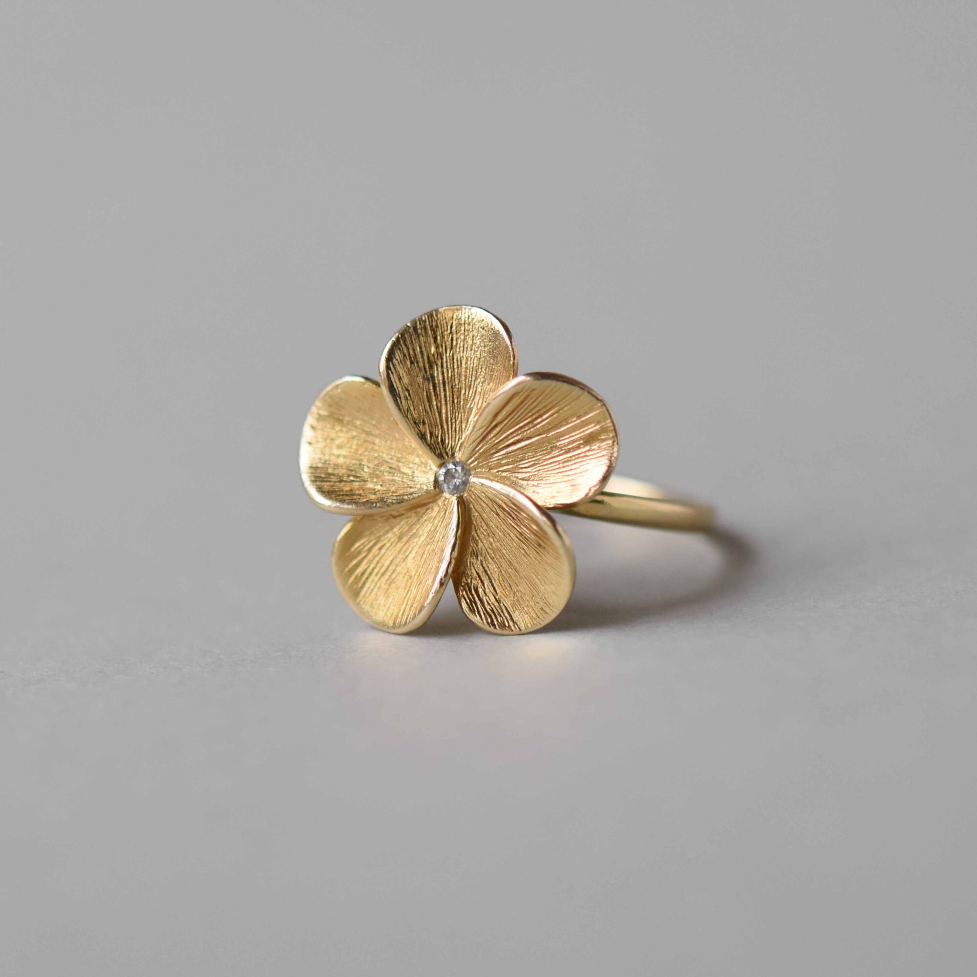 Contemporary 9ct gold diamond flower ring - Image 2