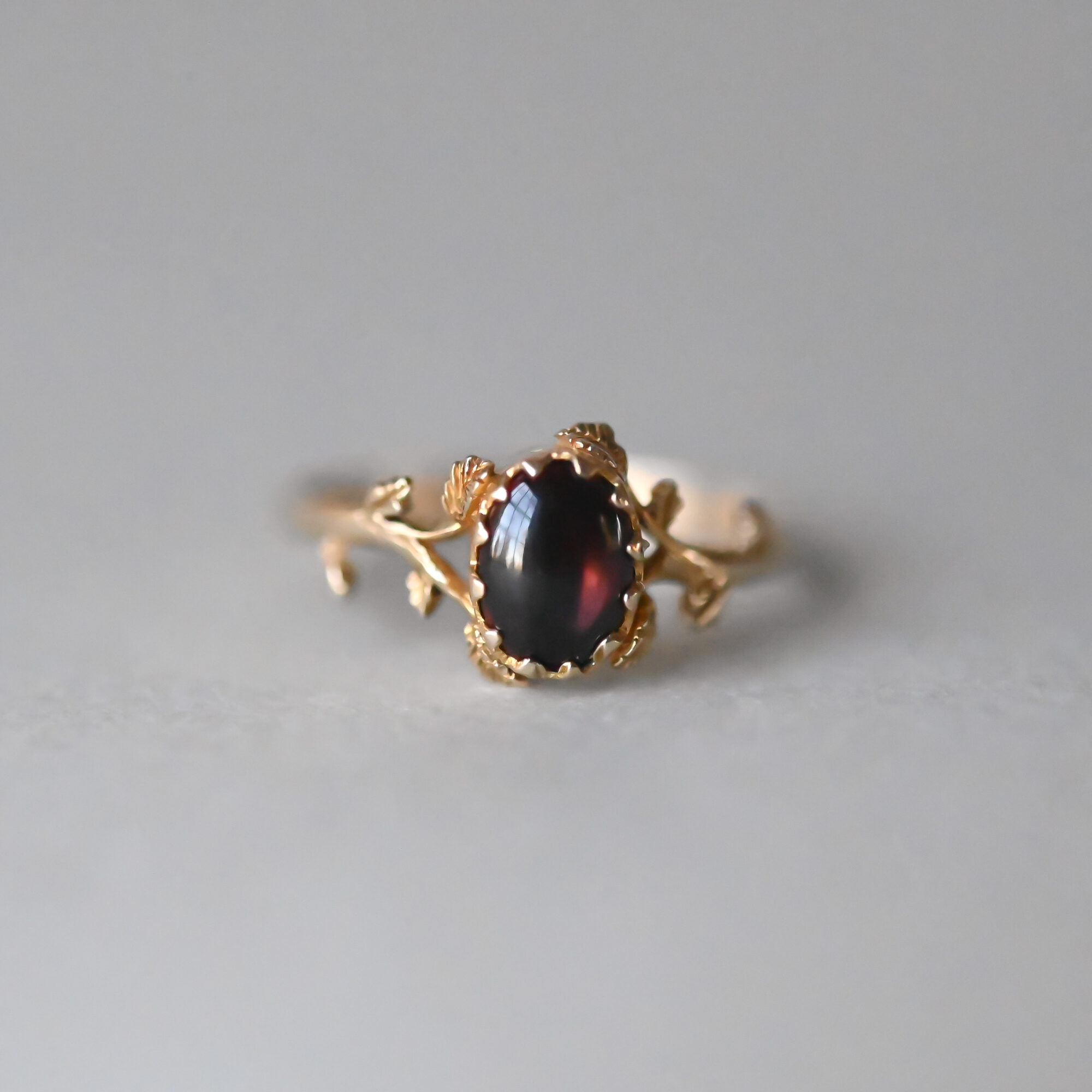 Contemporary 9ct gold garnet rosebud floral branch ring
