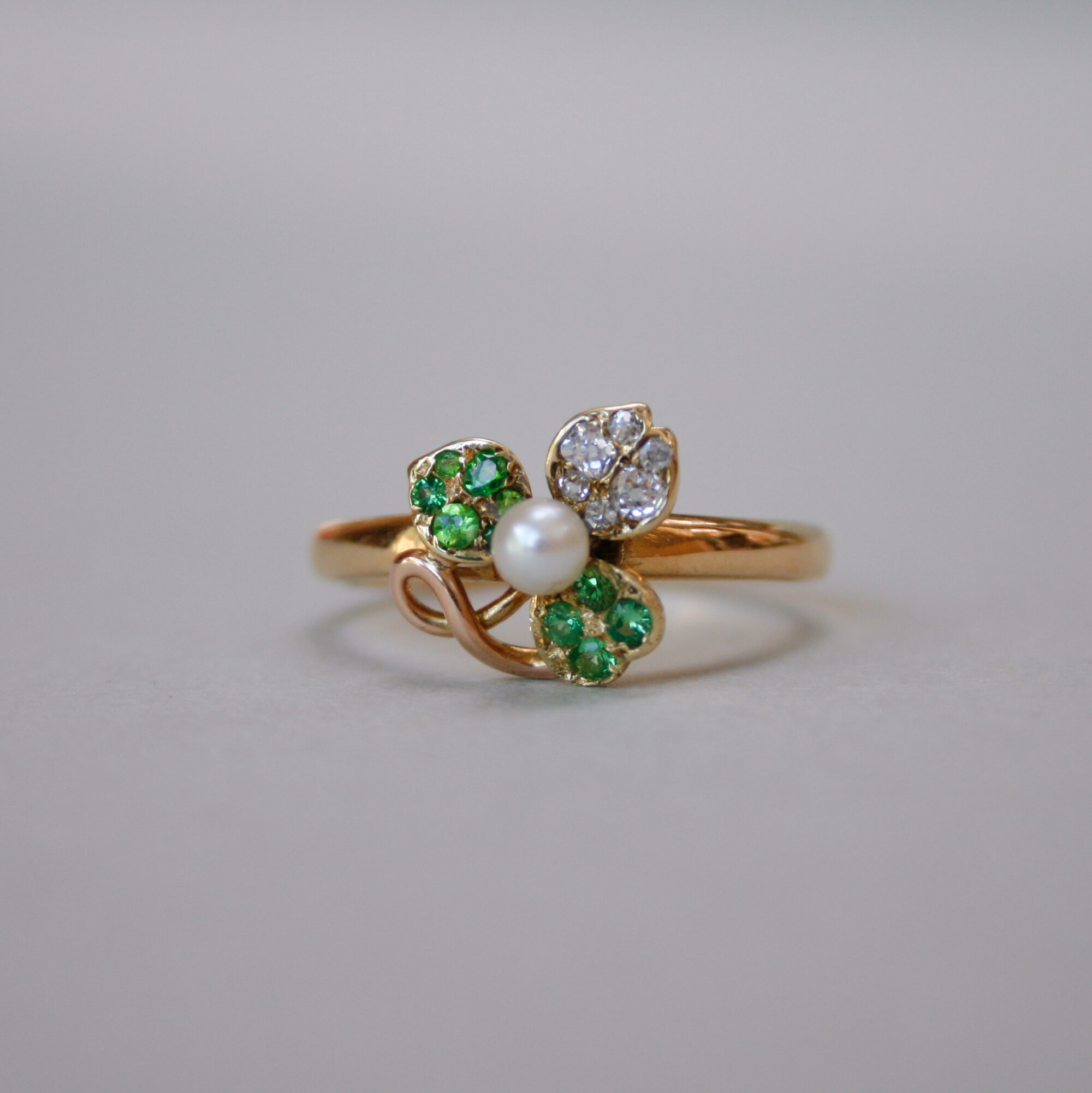 Antique late Victorian 18ct gold demantoid garnet, pearl and diamond shamrock ring