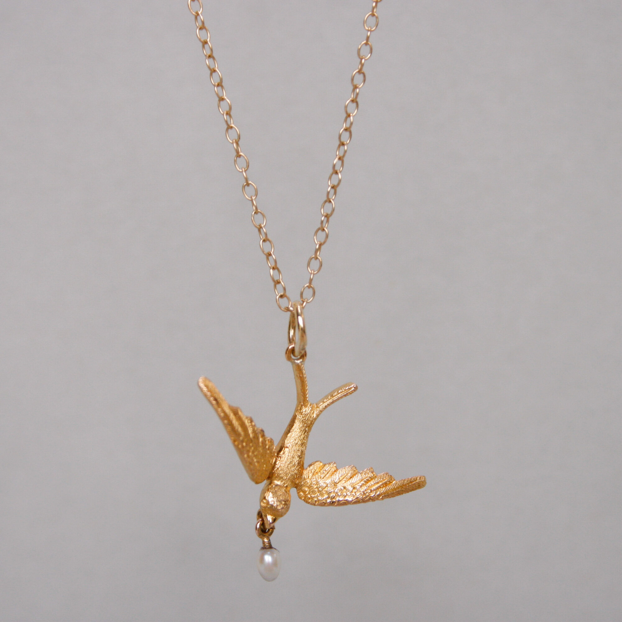 Antique Edwardian 15ct gold swallow and pearl drop pendant