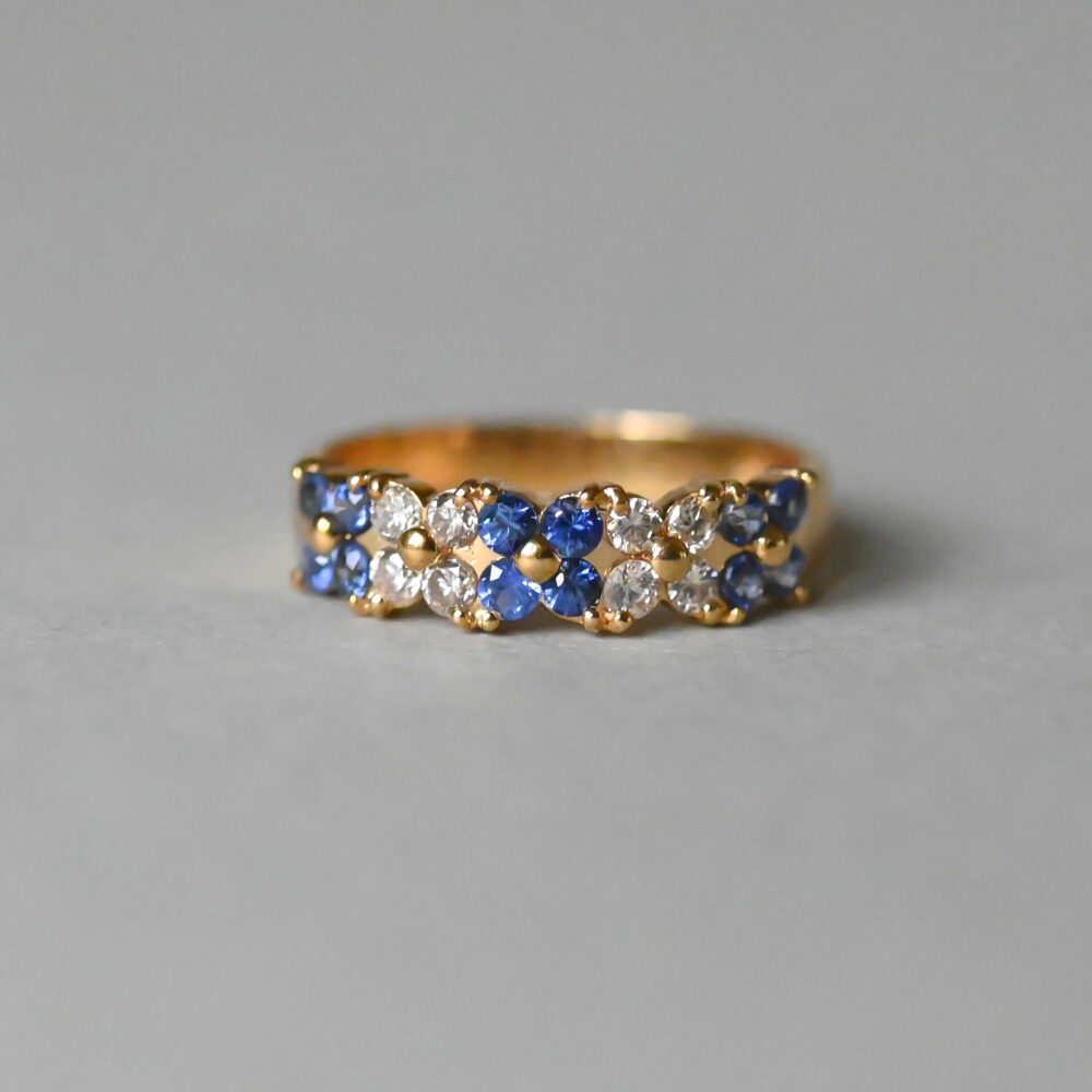 Aesthetic 18ct gold sapphire and diamond quatrefoil flower band ring