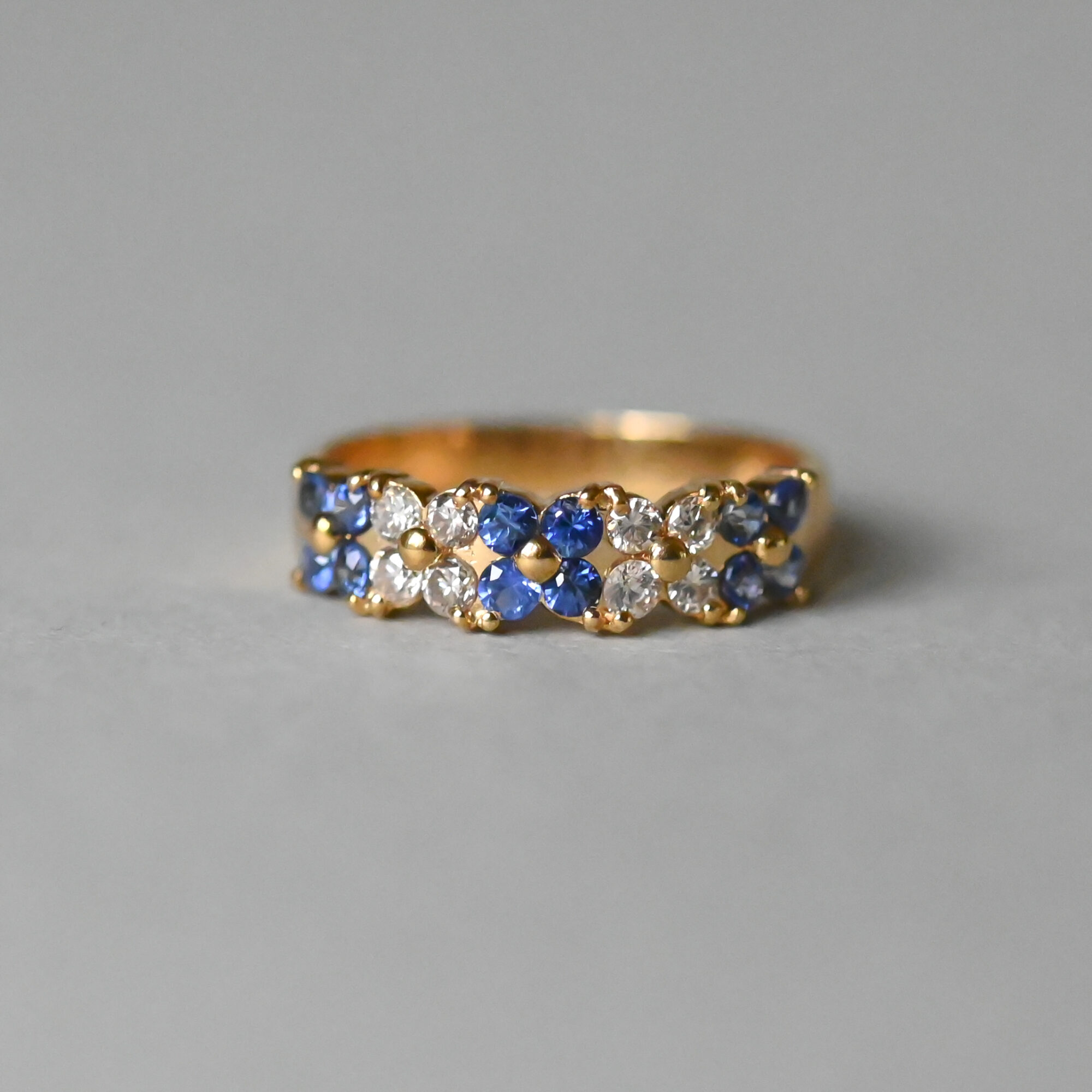 Aesthetic 18ct gold sapphire and diamond quatrefoil flower band ring