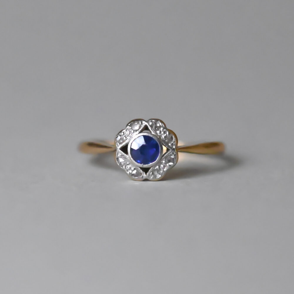 Art Deco 18ct gold and platinum verneuil sapphire and mini diamond cluster ring