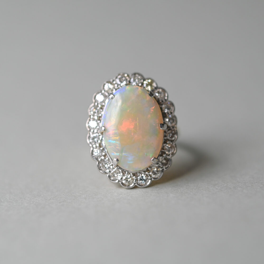 Classic 18ct gold opal and diamond cluster ring