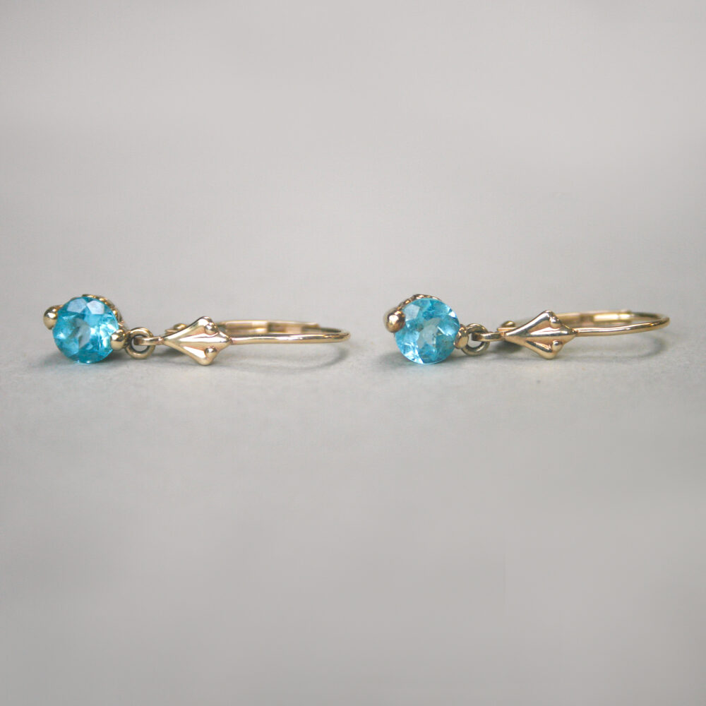 Pair of contemporary 9ct gold blue topaz drop earrings