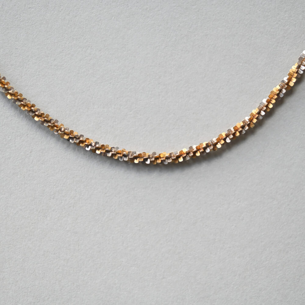 Contemporary 9ct white and yellow gold fancy shimmering chain necklace