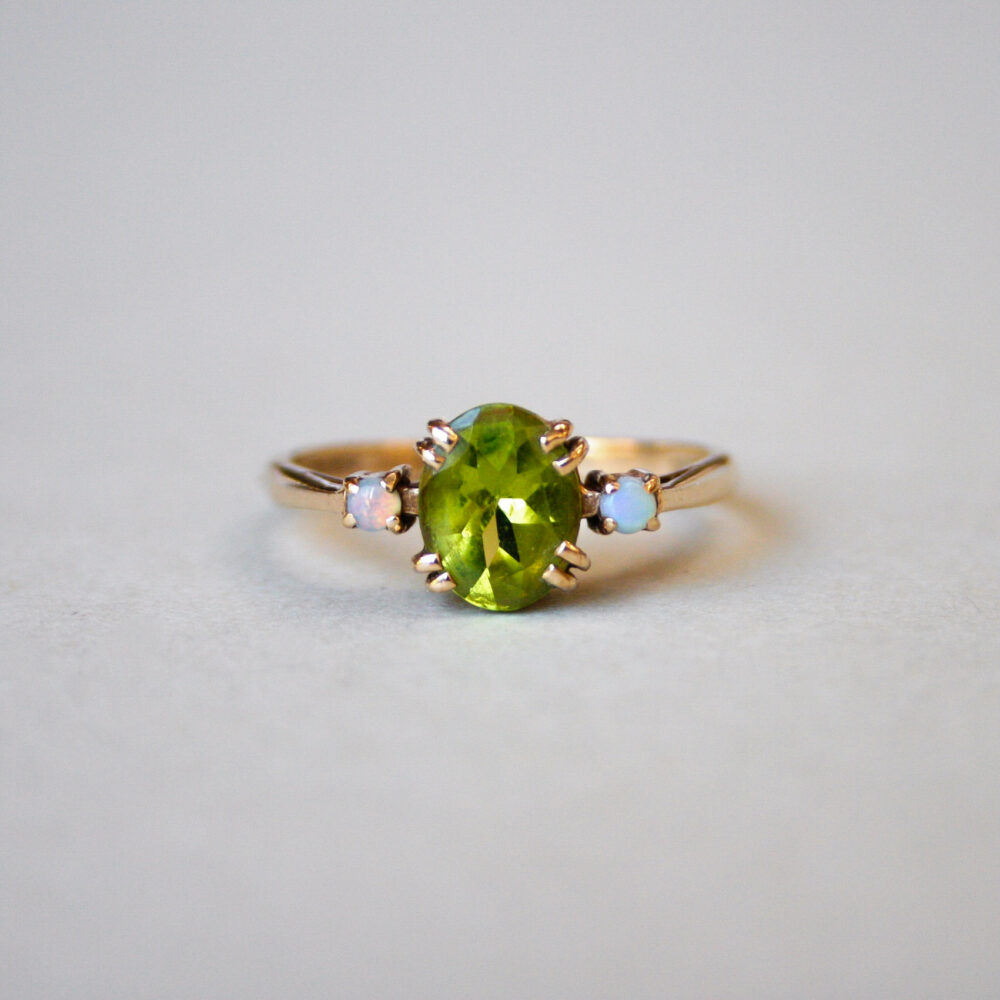 Contemporary 9ct gold peridot and opal ring
