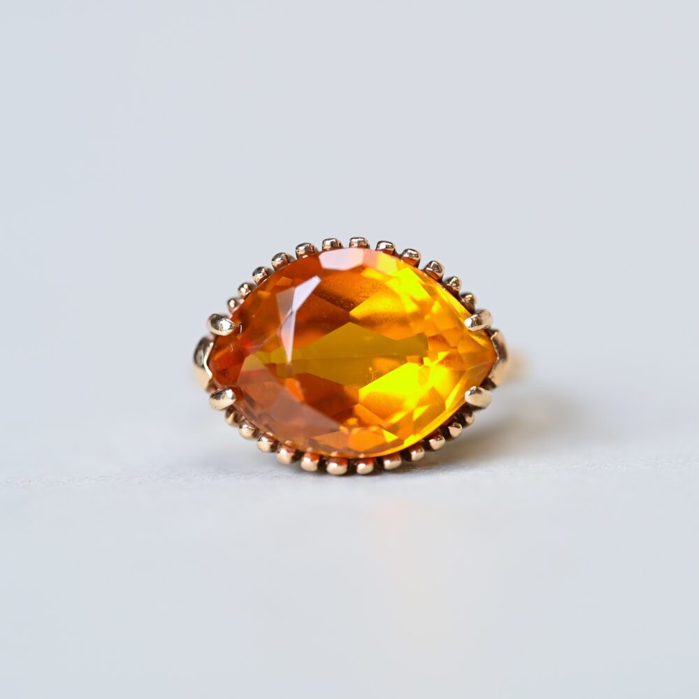 Aesthetic 9ct gold synthetic yellow sapphire ring