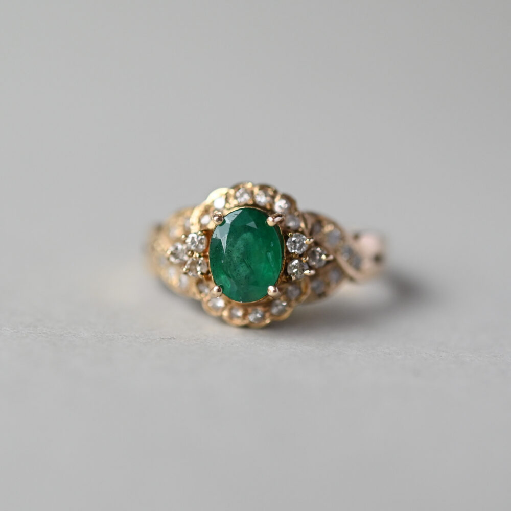 Classic 14ct gold emerald and diamond tiered cluster ring