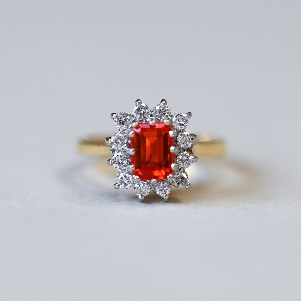 Classic 18ct gold fire opal and diamond cluster ring
