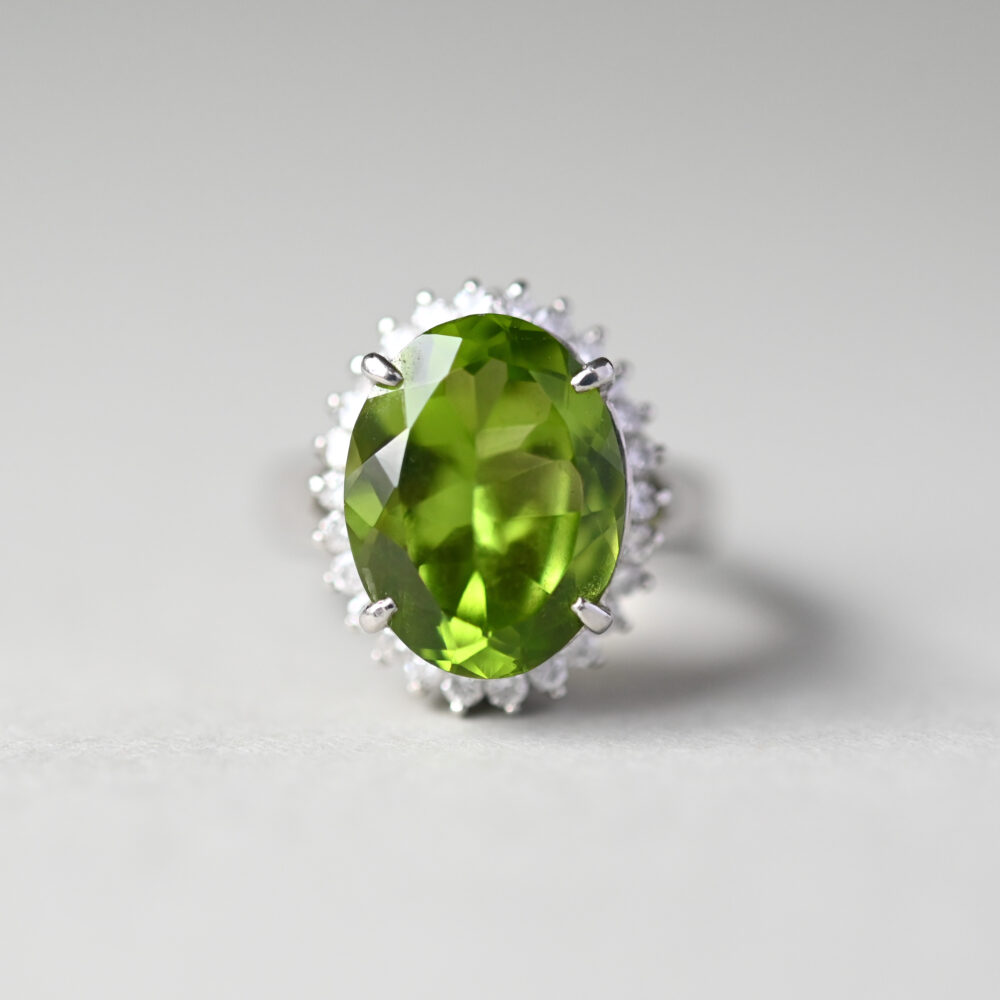 Classic 5.29 carat peridot and diamond platinum cluster ring