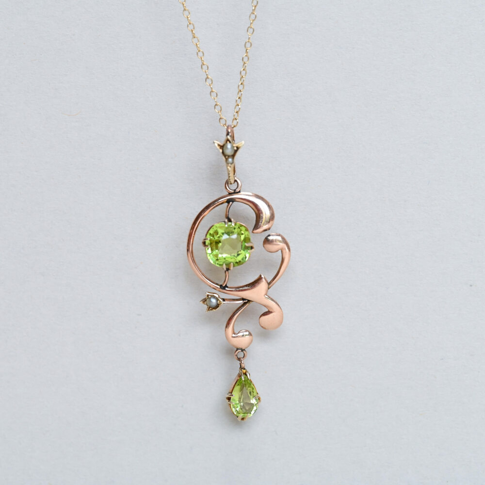 Antique Art Nouveau 9ct gold peridot and seed pearl foliate drop pendant