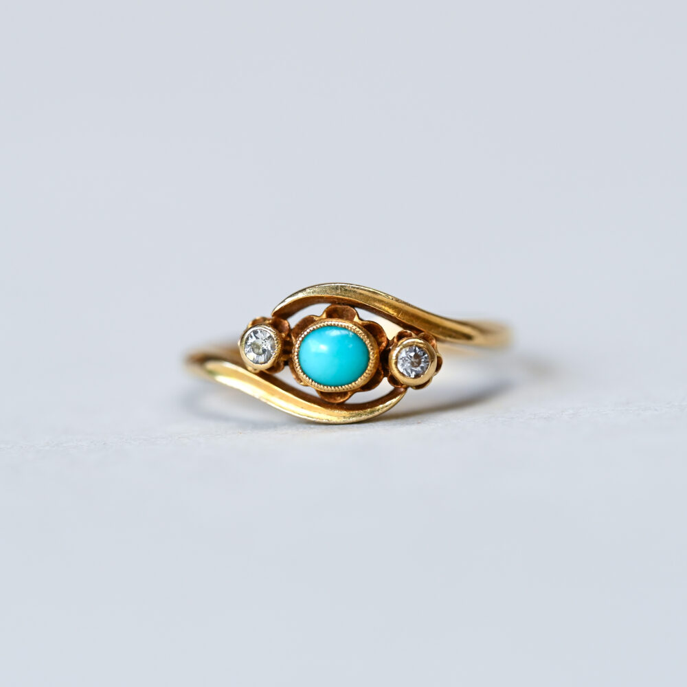 Antique 18ct gold turquoise and old cut diamond buttercup crossover ring, 1914