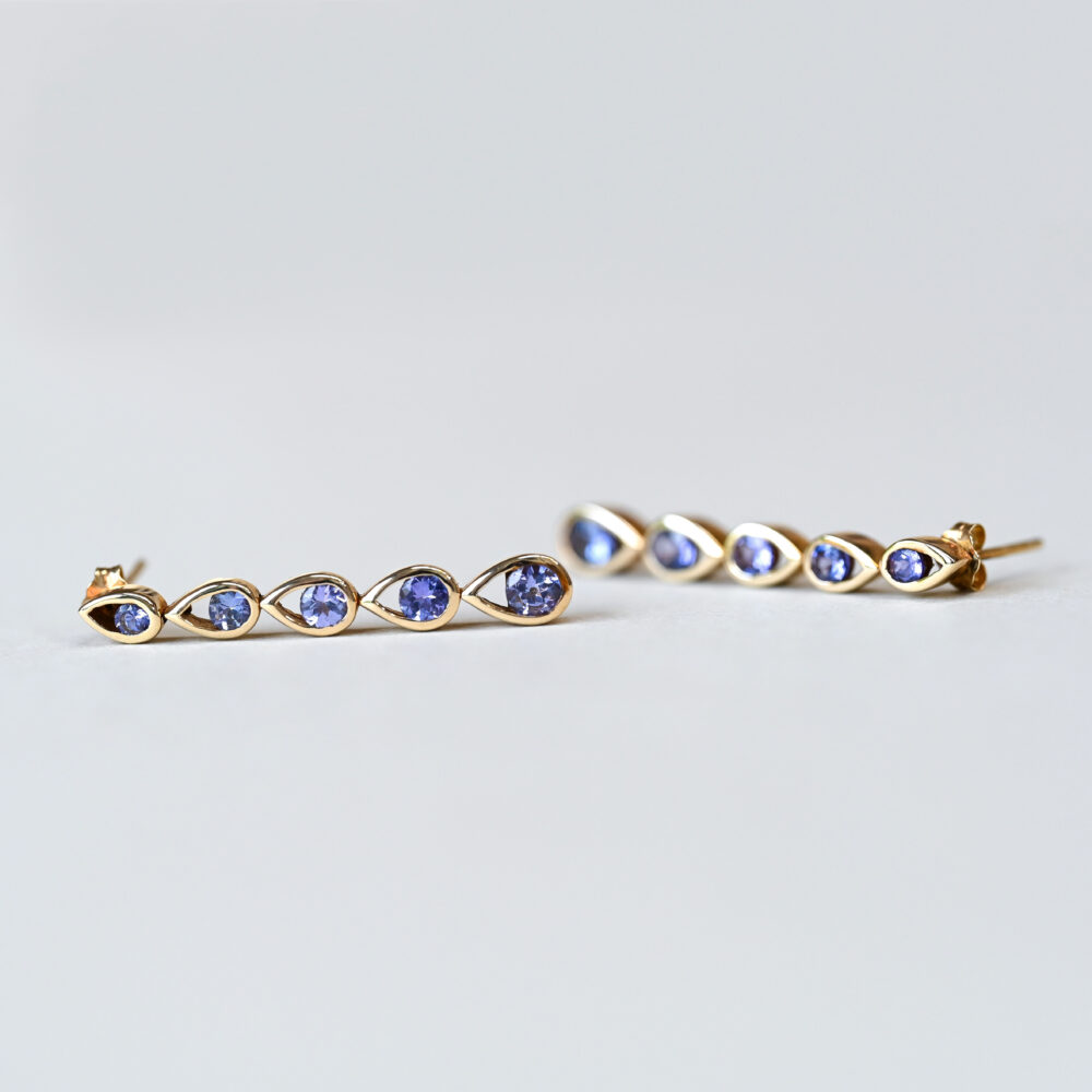 Contemporary pair of 9ct gold tanzanite drop earrings